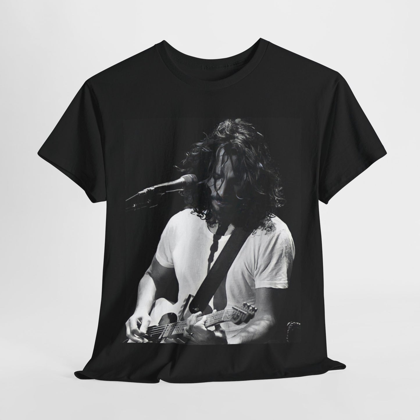 A black graphic t-shirt featuring a 90s-style graphic of Chris Cornell, evoking the Seattle sound aesthetic.