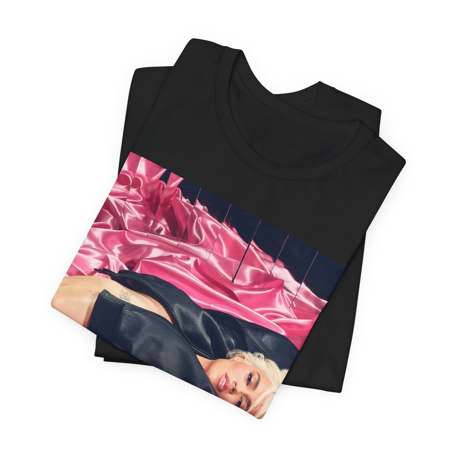A black graphic t-shirt featuring a vintage aesthetic graphic related to Karol G's 'Tusa' era.