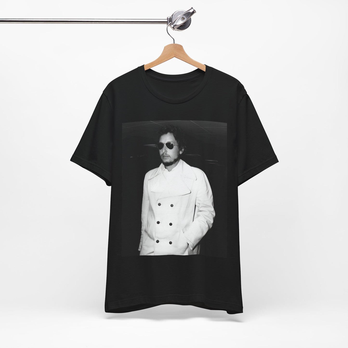A black graphic t-shirt featuring a vintage black and white photo of Bob Dylan in a contemplative or iconic pose.