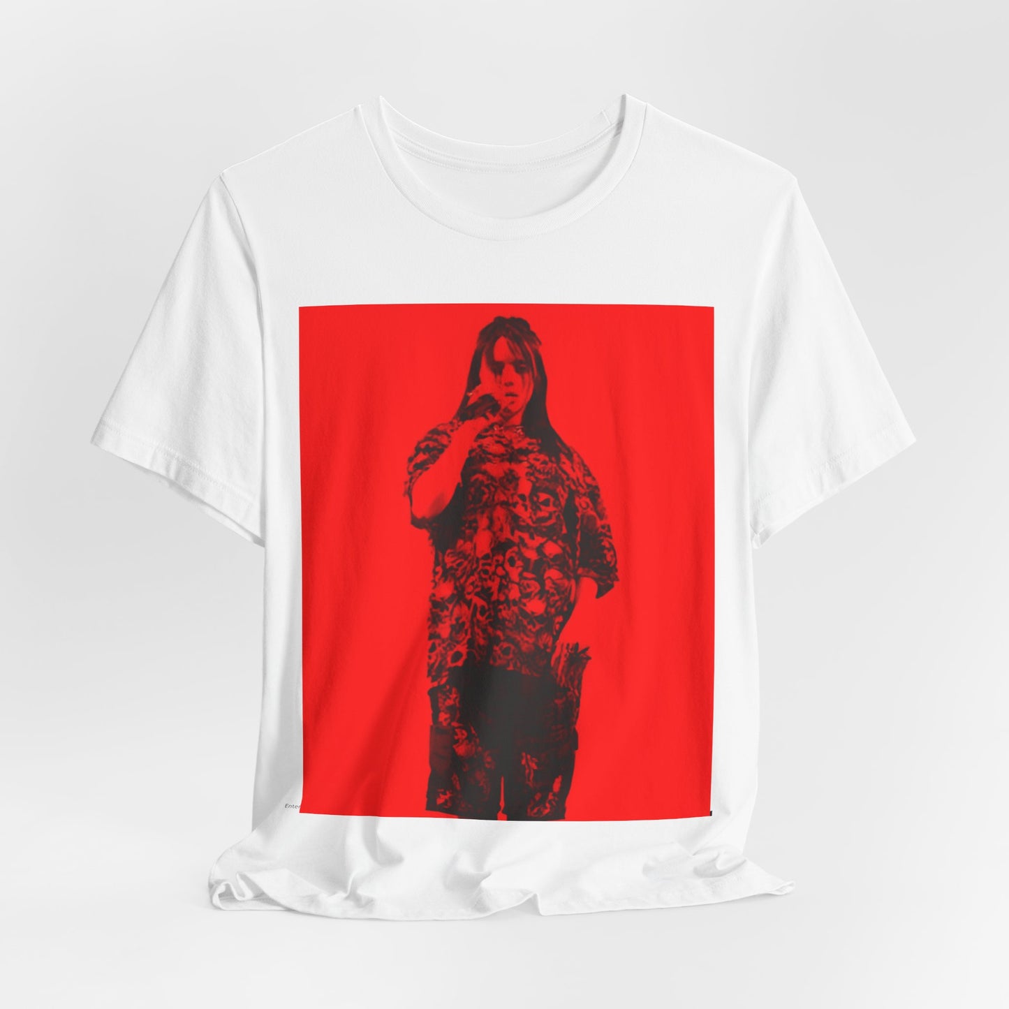 A portrait of Billie Eilish with platinum blonde hair from her 'Happier Than Ever' era, looking over her shoulder, printed on a graphic t-shirt.