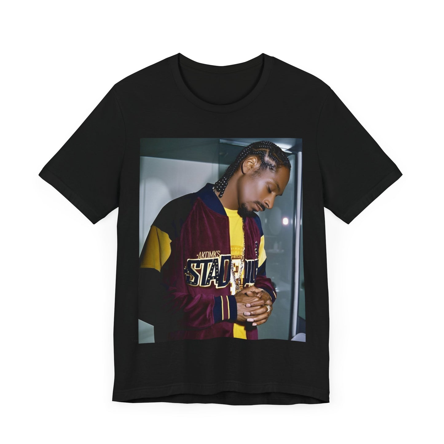 A black graphic t-shirt featuring a classic graphic of Snoop Dogg with a cool gaze.