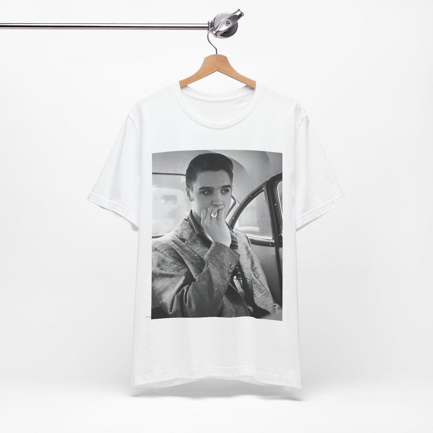 A black graphic t-shirt featuring a classic 50s era graphic of Elvis Presley.