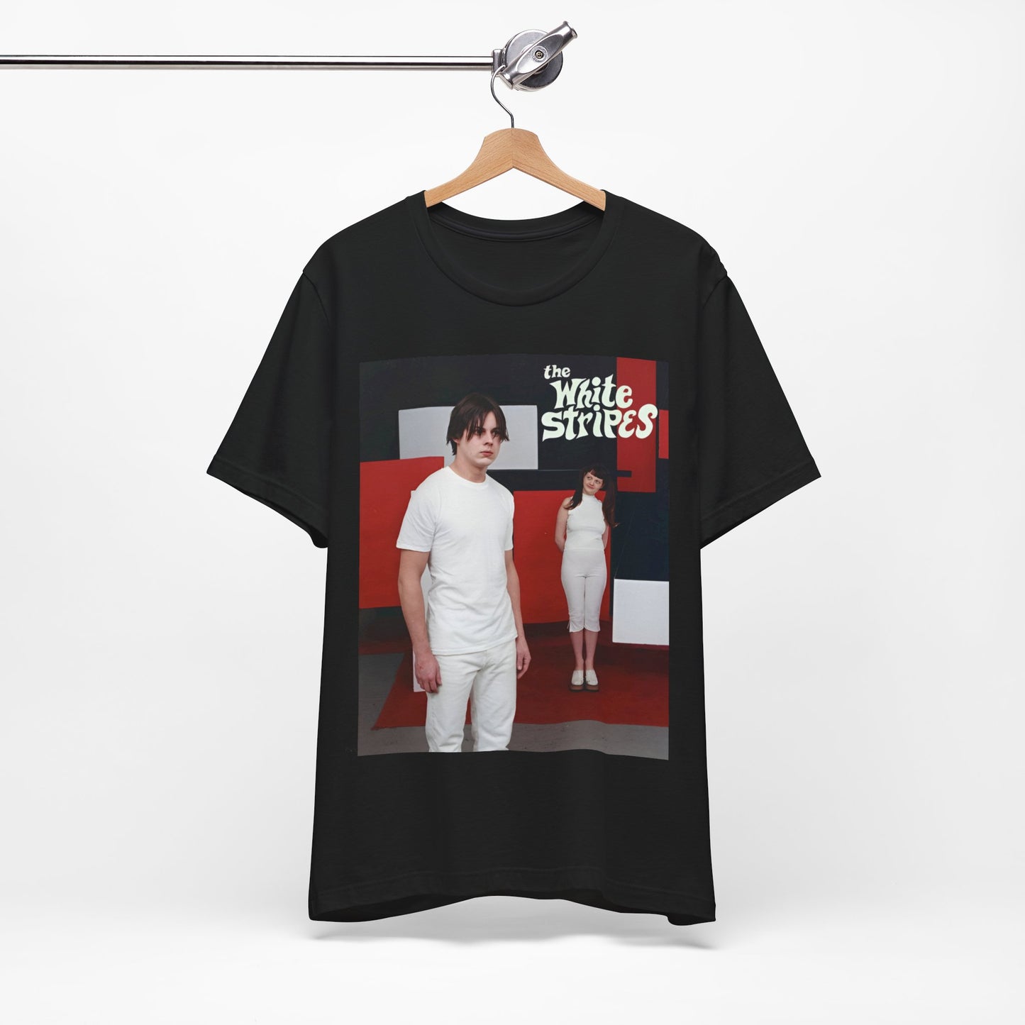 A black graphic t-shirt featuring a red and white aesthetic graphic of The White Stripes.
