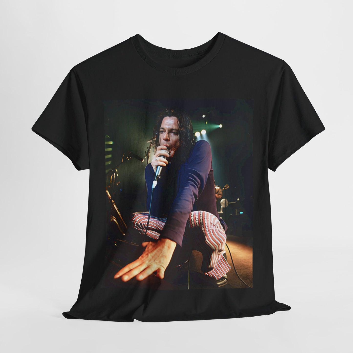 A black graphic t-shirt featuring a graphic related to INXS's 'Elegantly Wasted' album era.