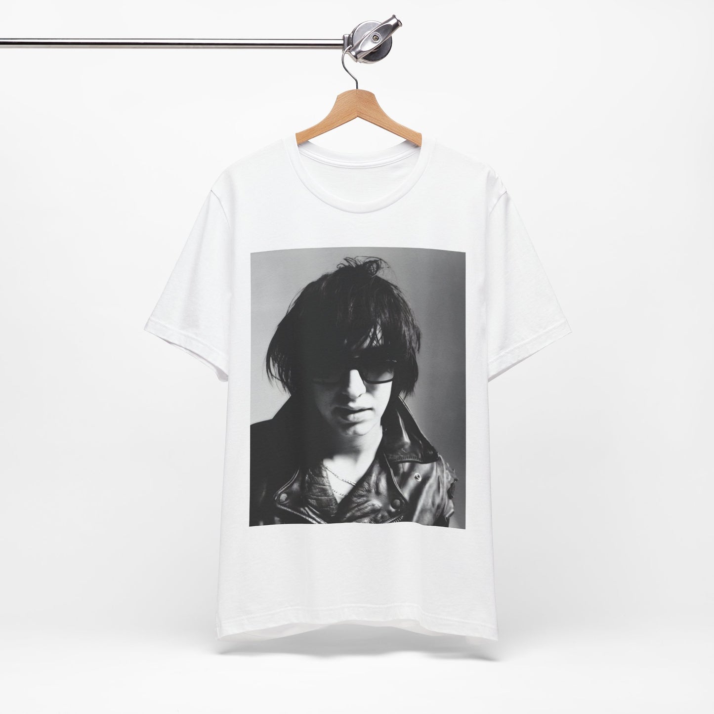 A black graphic t-shirt featuring a graphic related to The Strokes' 'Reptilia' song or era.