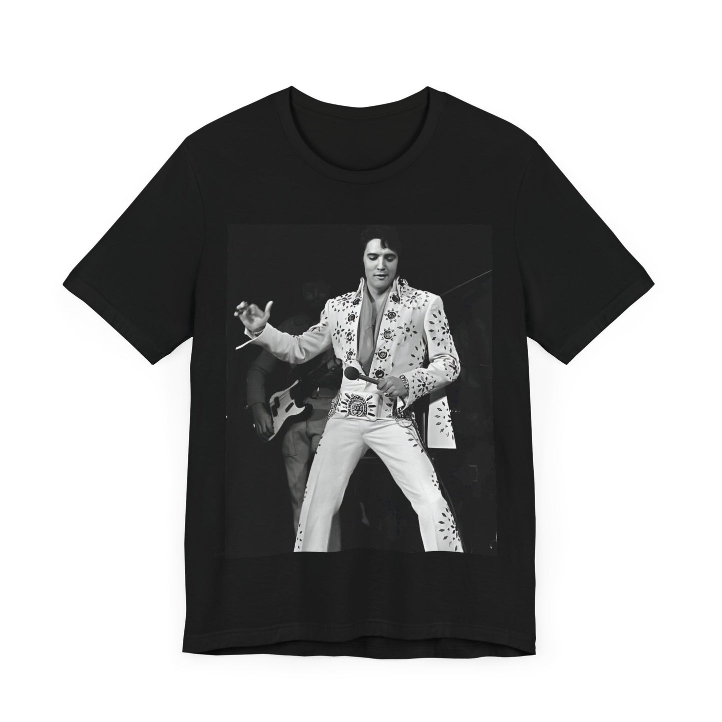 A black graphic t-shirt featuring a stylized graphic of Elvis Presley as The King of Rock 'n' Roll.