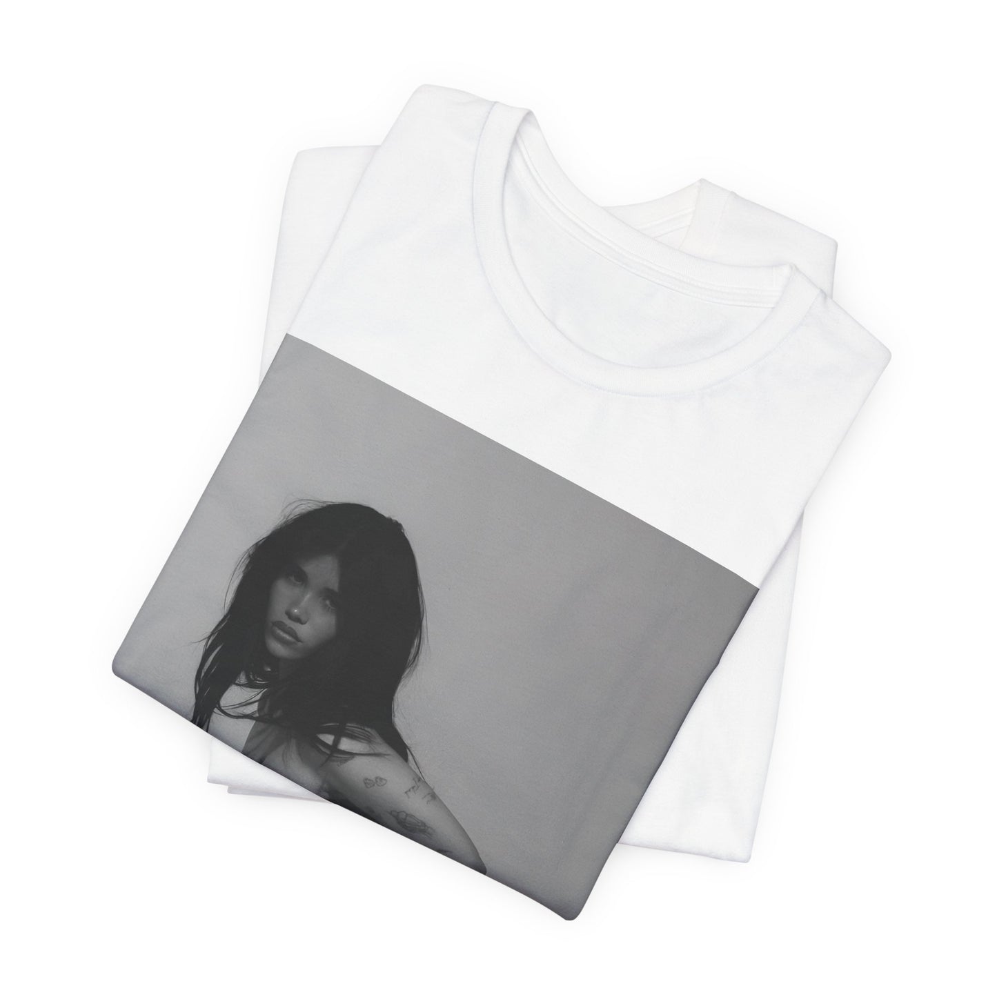 A black graphic t-shirt featuring a black and white, monochrome graphic or photo of Nessa Barrett.