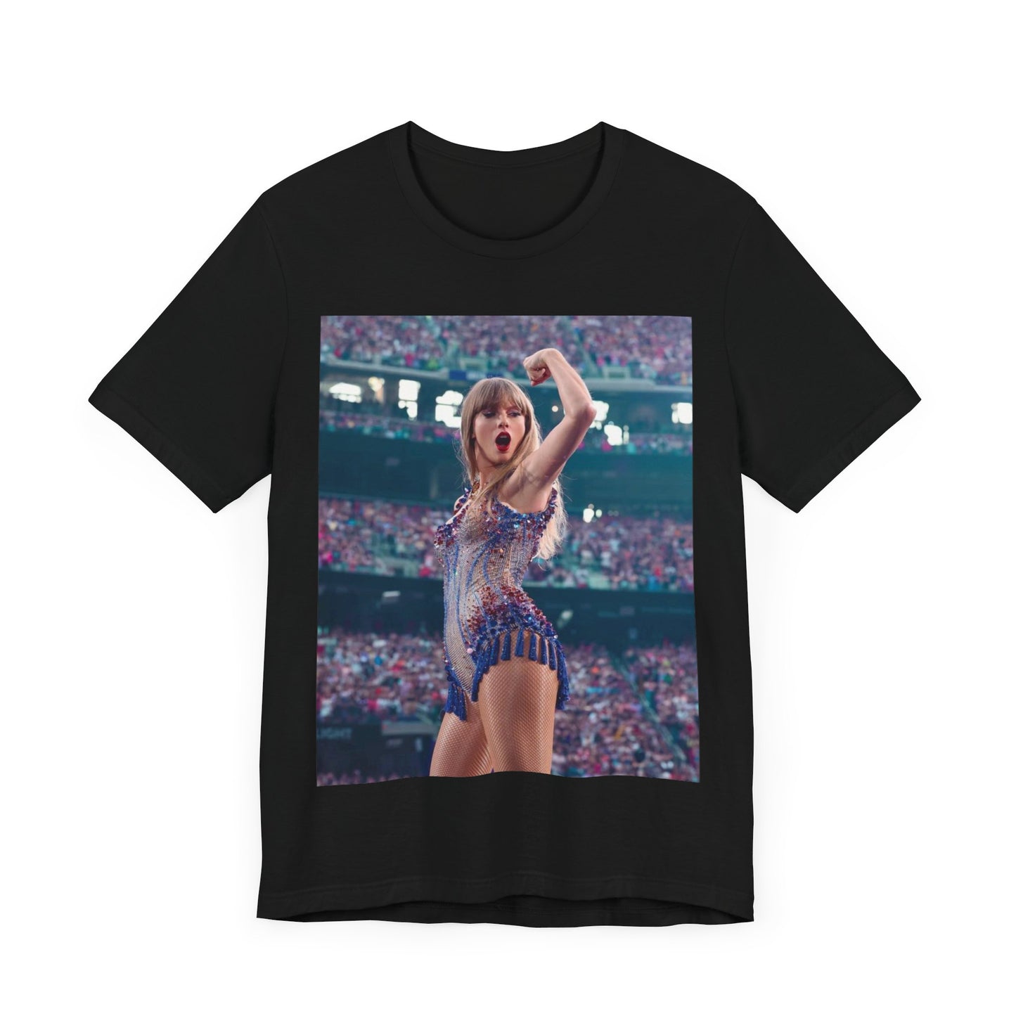 A black graphic t-shirt featuring a graphic or photo of Taylor Swift performing live on stage.