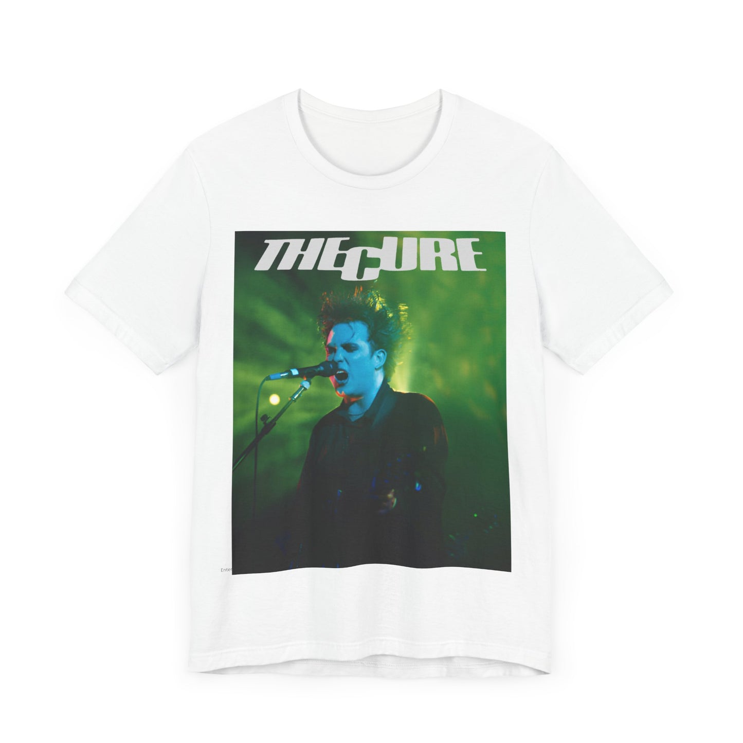 A black graphic t-shirt featuring a graphic or photo of The Cure performing live on stage.
