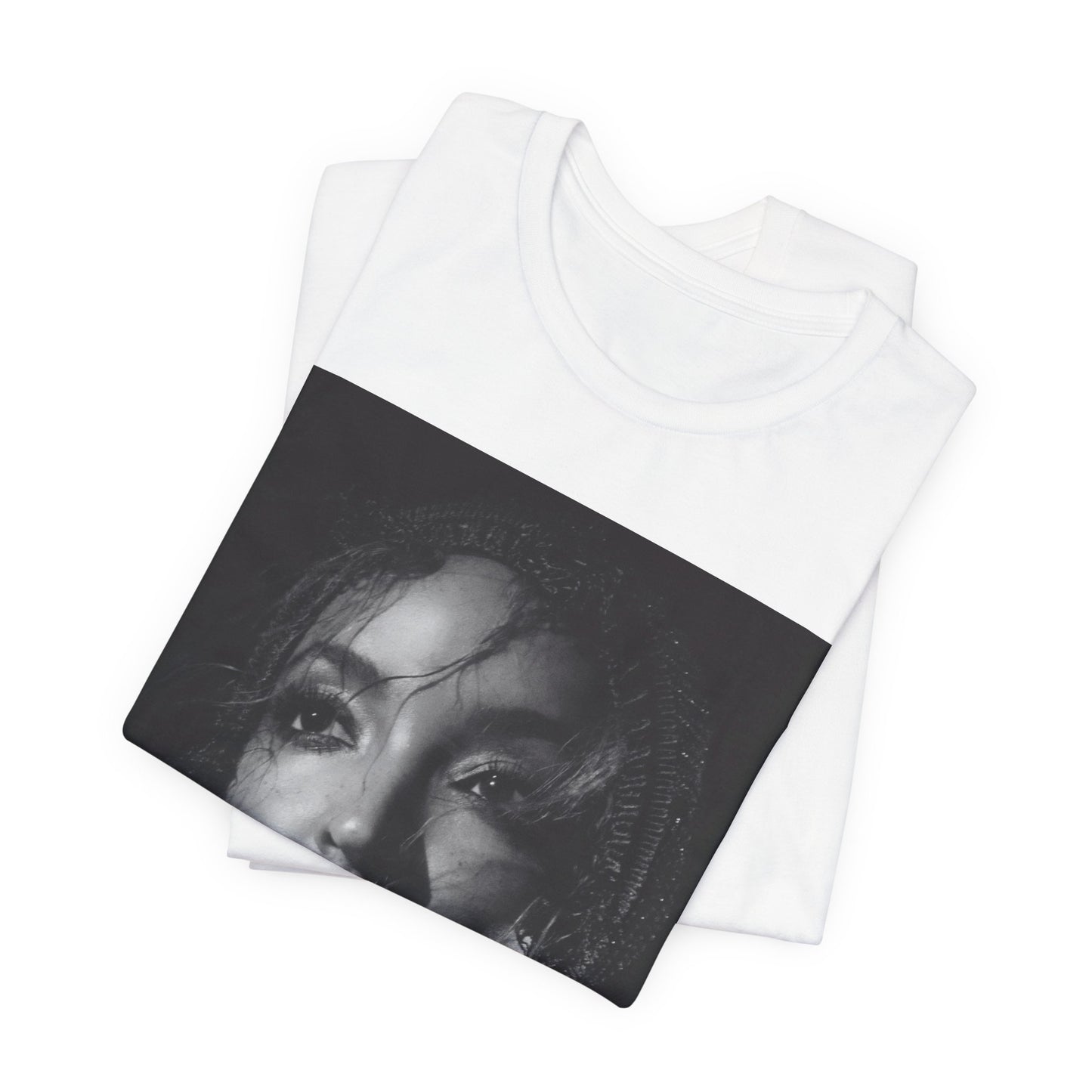 A black graphic t-shirt featuring a black and white portrait photo of Tinashe.