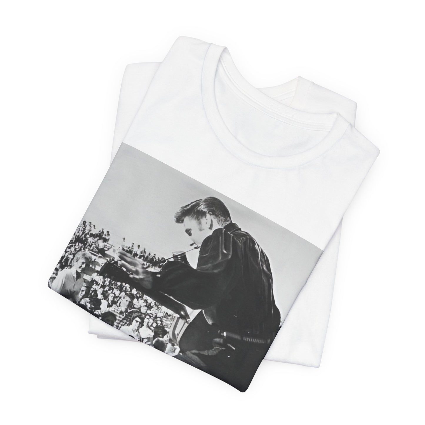 A black graphic t-shirt featuring a retro photo of Elvis Presley performing live in concert in the 1950s.