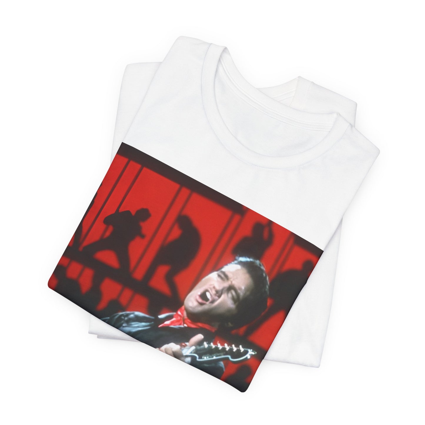 A black graphic t-shirt featuring a vintage photo of Elvis Presley from his Las Vegas residency.