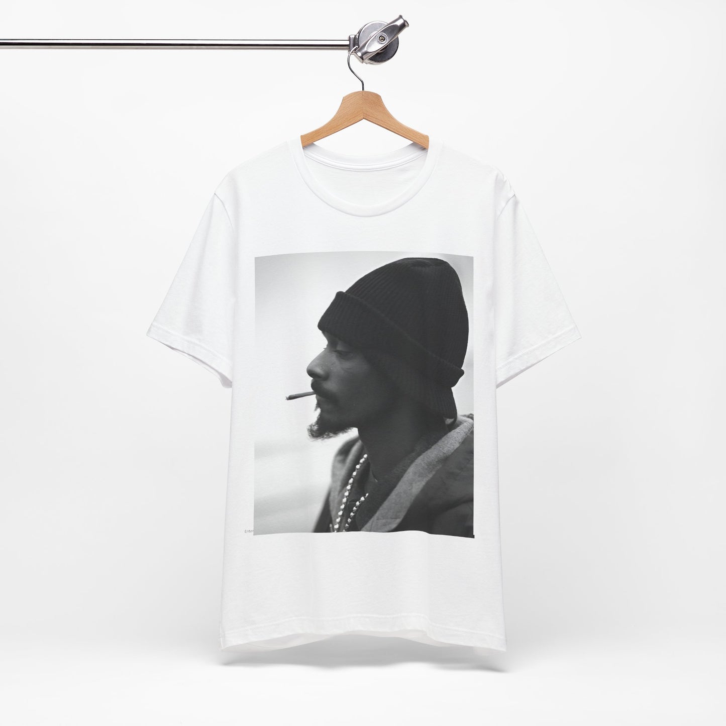 A black graphic t-shirt featuring a graphic of Snoop Dogg designed for everyday West Coast style.