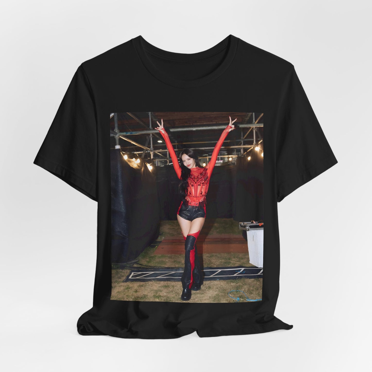 A black graphic t-shirt featuring a classic graphic of Lisa as a Blackpink rapper.