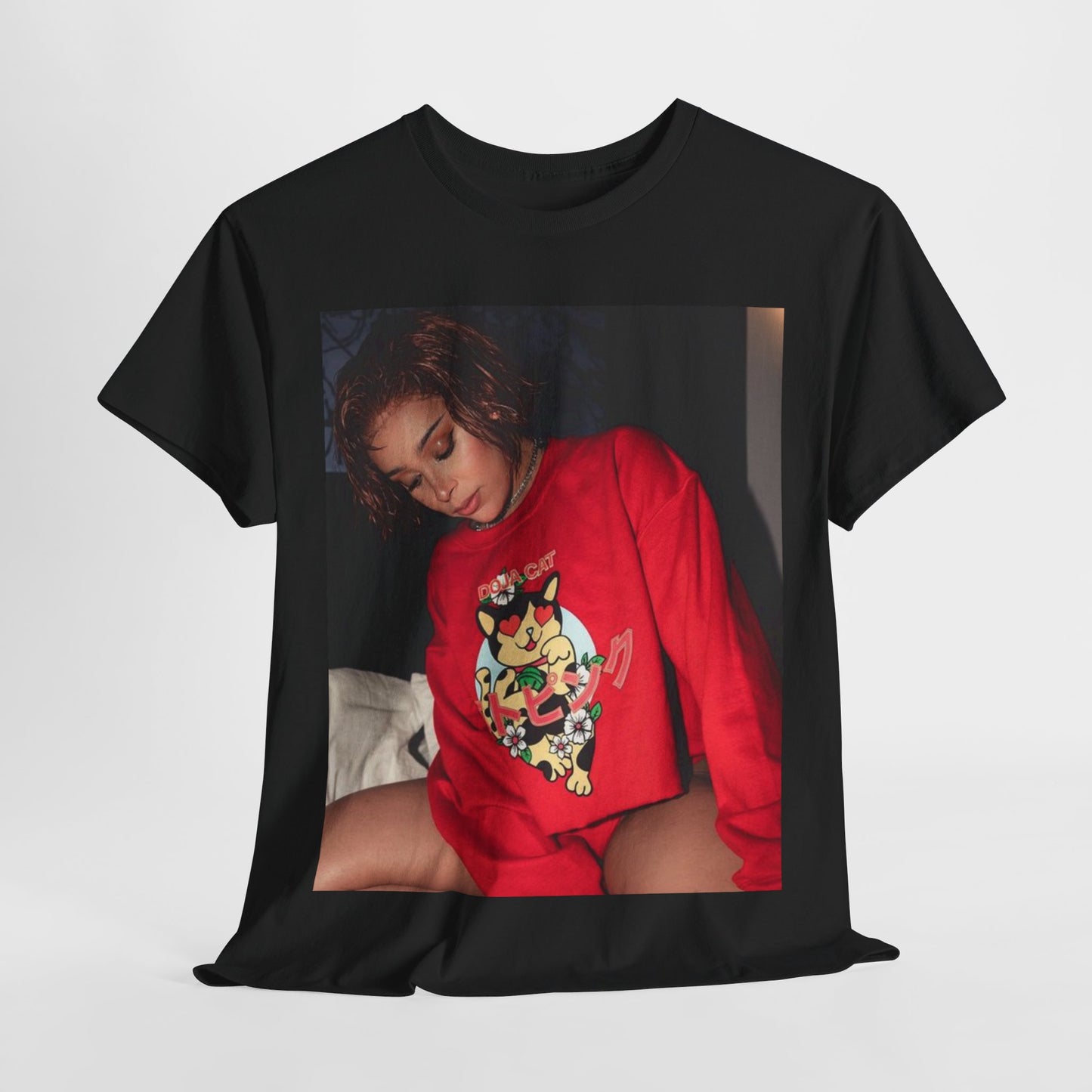 A black graphic t-shirt featuring a graphic of Doja Cat as a style icon.