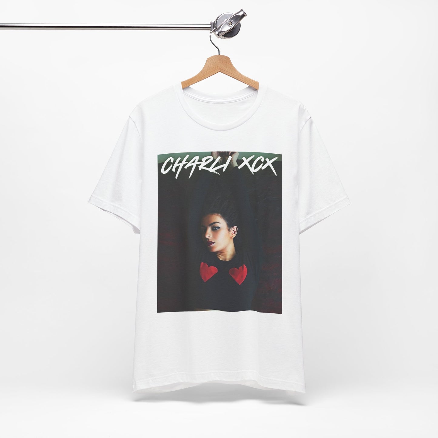 A black graphic t-shirt featuring a graphic of Charli XCX, designed with a future pop diva aesthetic.