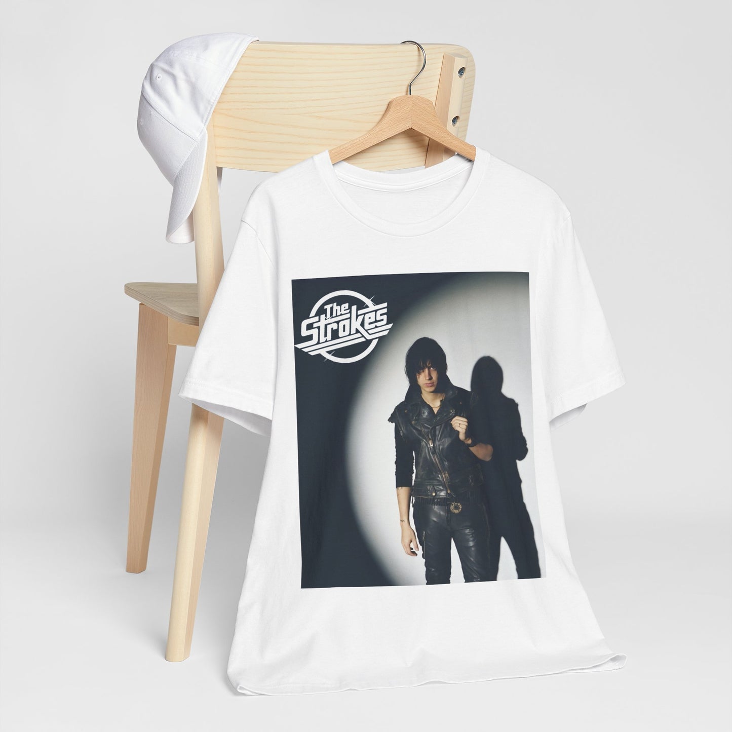 A black graphic t-shirt featuring a classic NYC garage rock graphic of The Strokes.