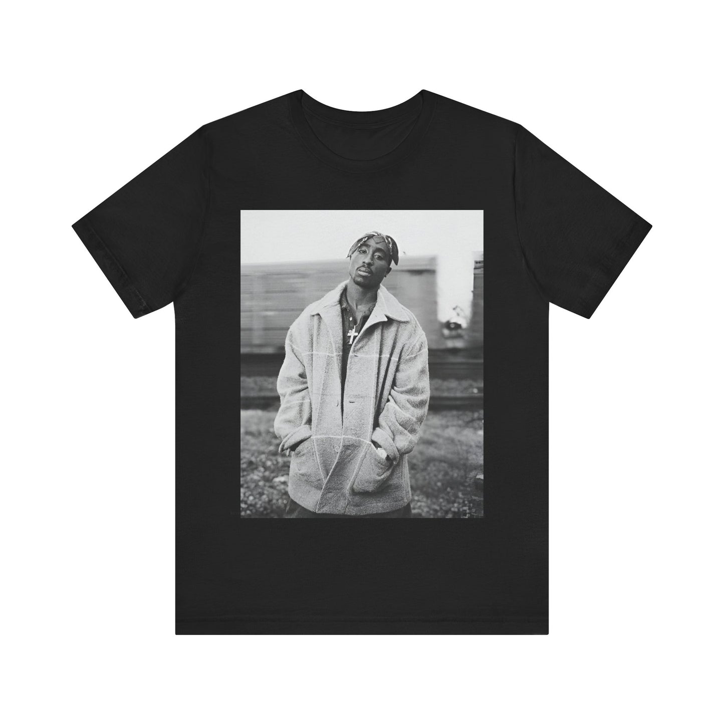A black graphic t-shirt featuring a graphic related to Tupac's 'Thug Life' philosophy.