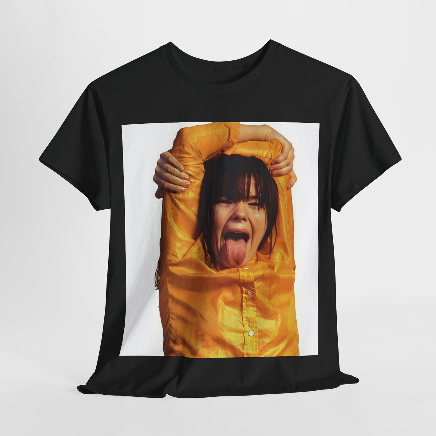 A black graphic t-shirt featuring a photo of Bjork with her tongue playfully sticking out.