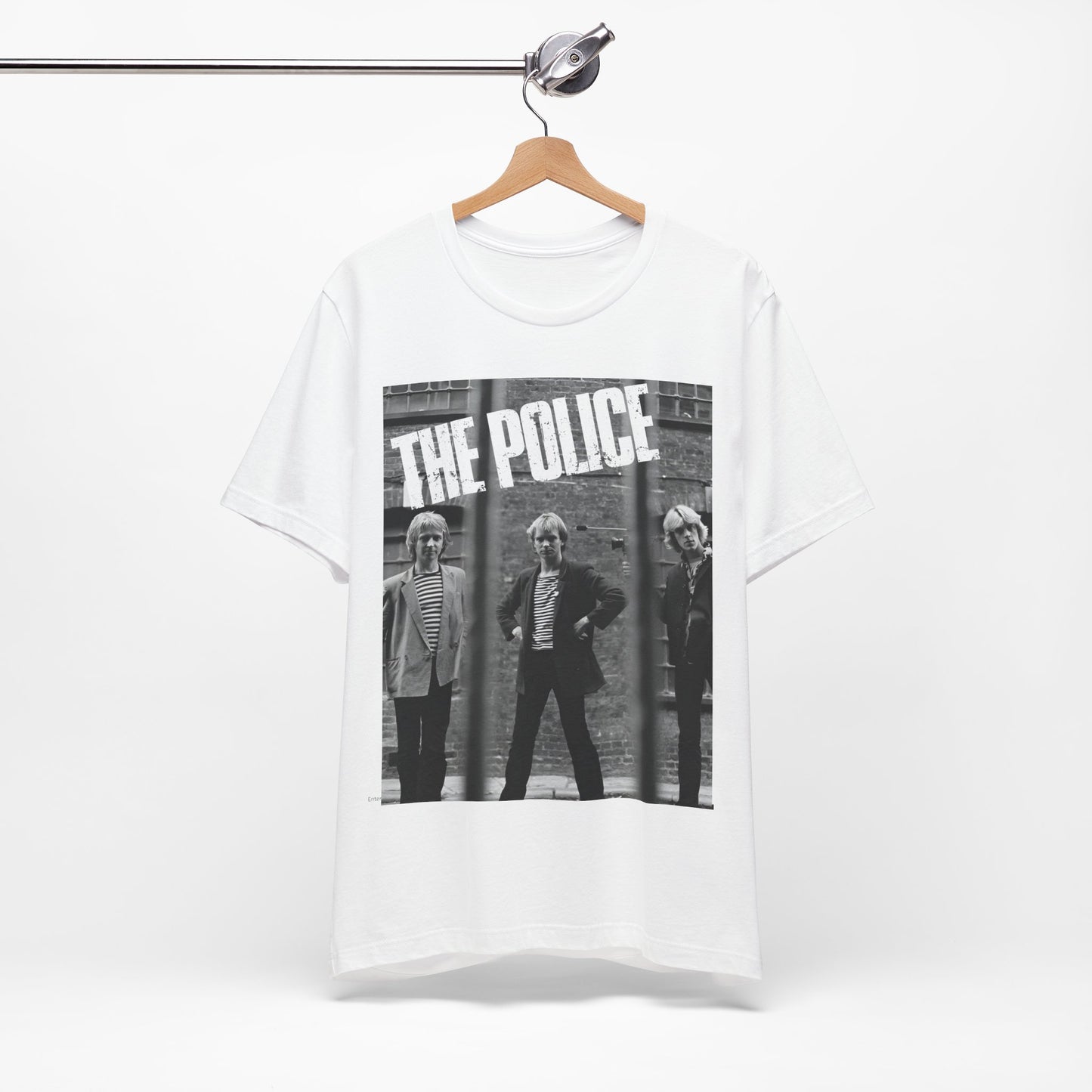 A black graphic t-shirt featuring a vintage new wave icon graphic of The Police.