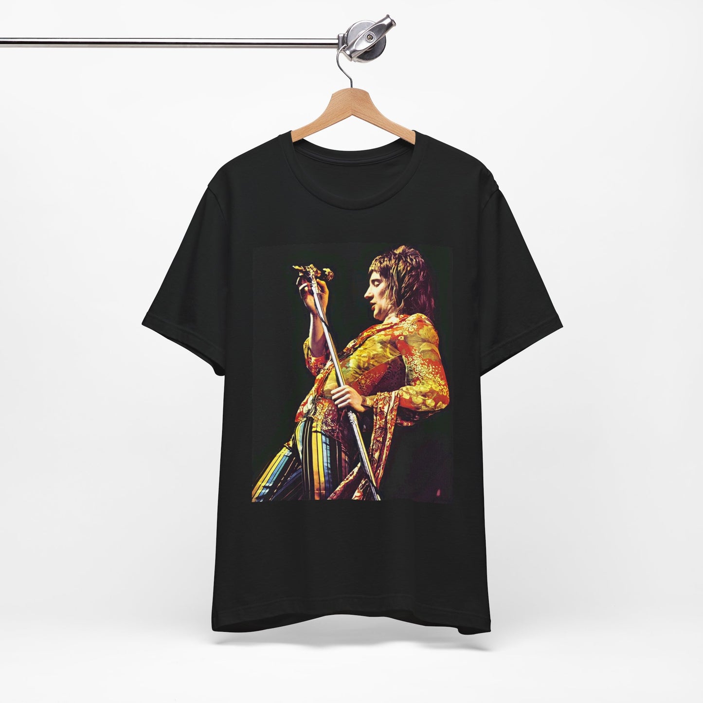 A black graphic t-shirt featuring a fierce graphic of Rod Stewart performing on stage from the 70s.