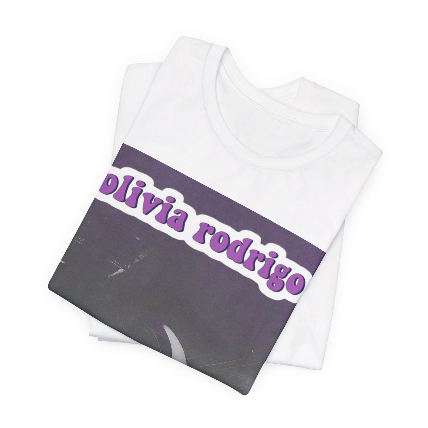 A black graphic t-shirt featuring a graphic or photo of Olivia Rodrigo performing live on stage.
