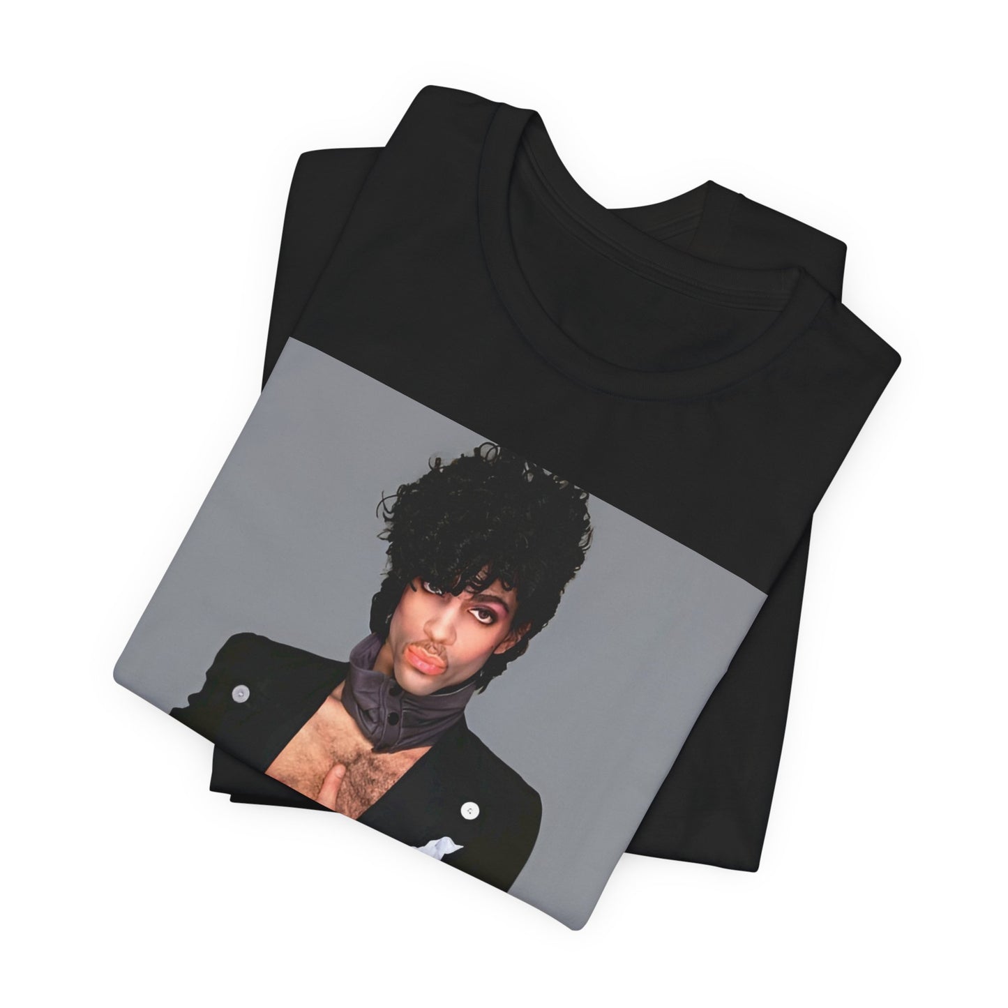 A black graphic t-shirt featuring a 90s vintage funk pop icon graphic of Prince.