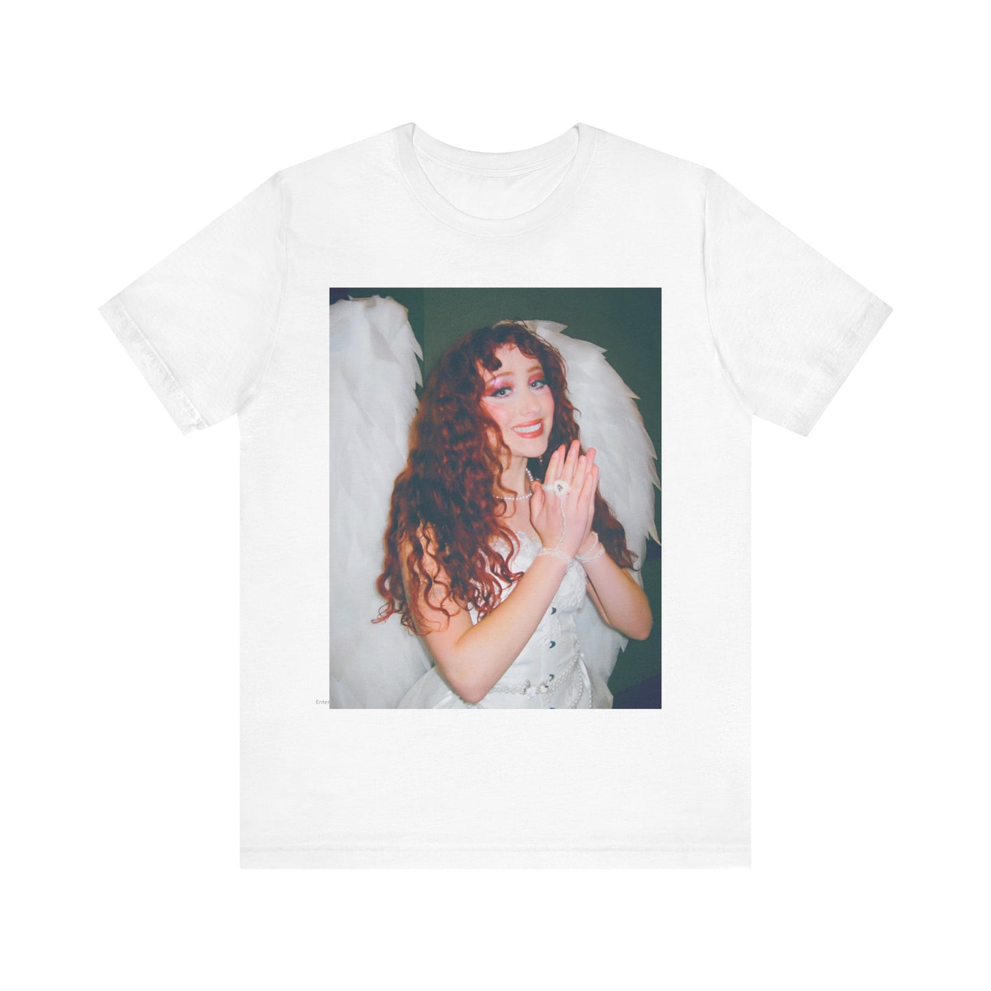 A black graphic t-shirt featuring a graphic of Chappell Roan, possibly with DIY or independent pop elements.