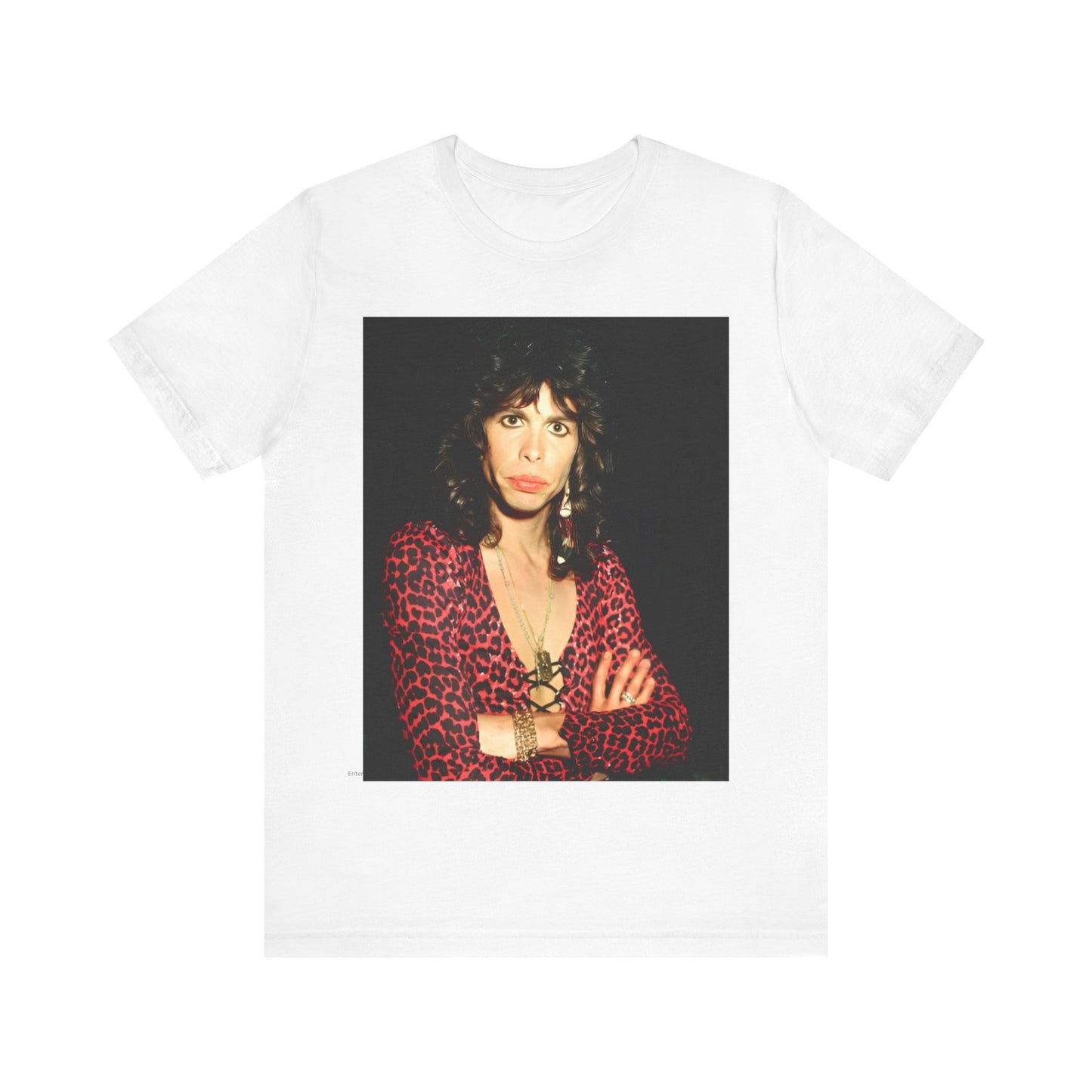 A black graphic t-shirt featuring a vintage 70s-inspired design with Aerosmith branding, incorporating a prominent leopard print pattern.