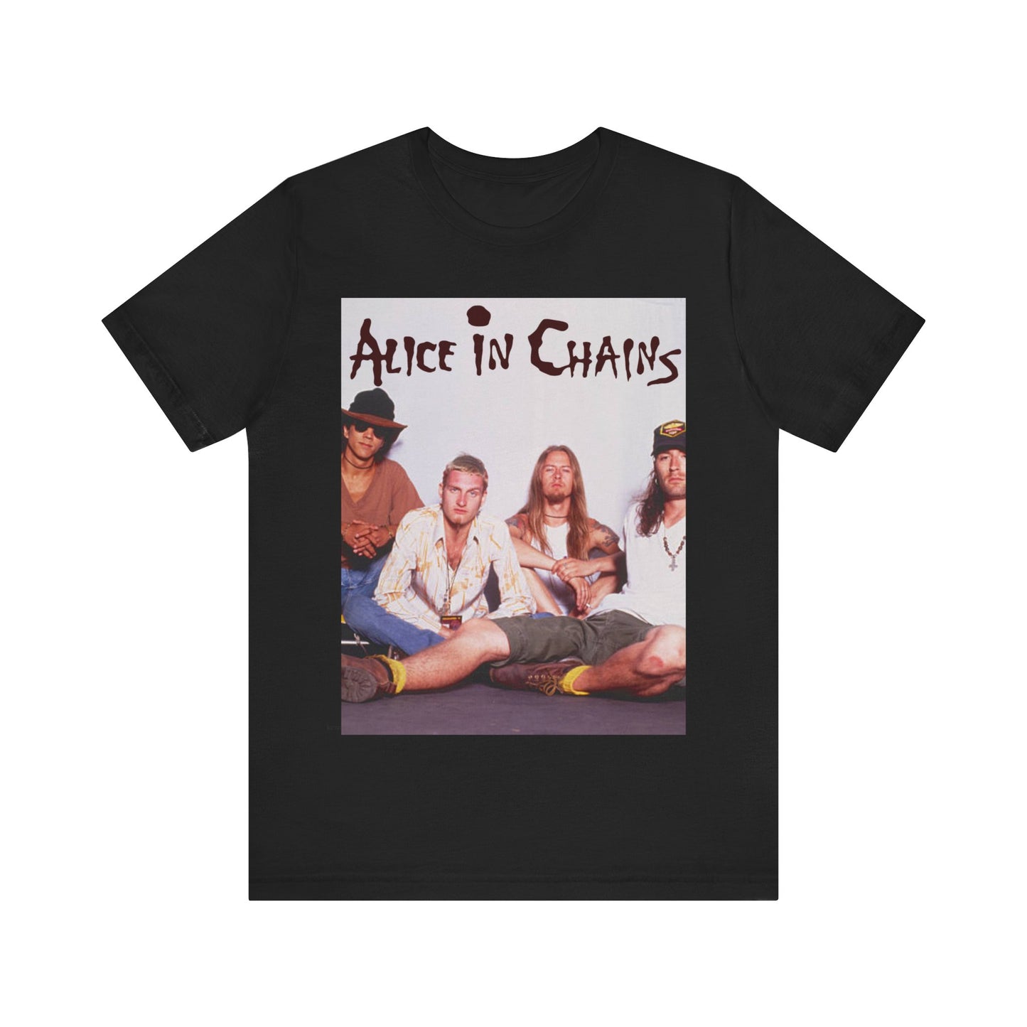 A black graphic t-shirt featuring a classic rock graphic of Alice In Chains from the 1990s, possibly with band members or stylized logo.