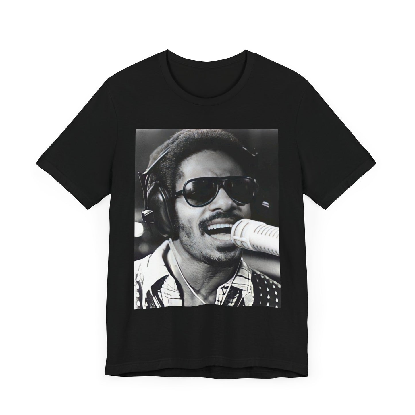 A black graphic t-shirt featuring a graphic of Stevie Wonder as a timeless visionary.
