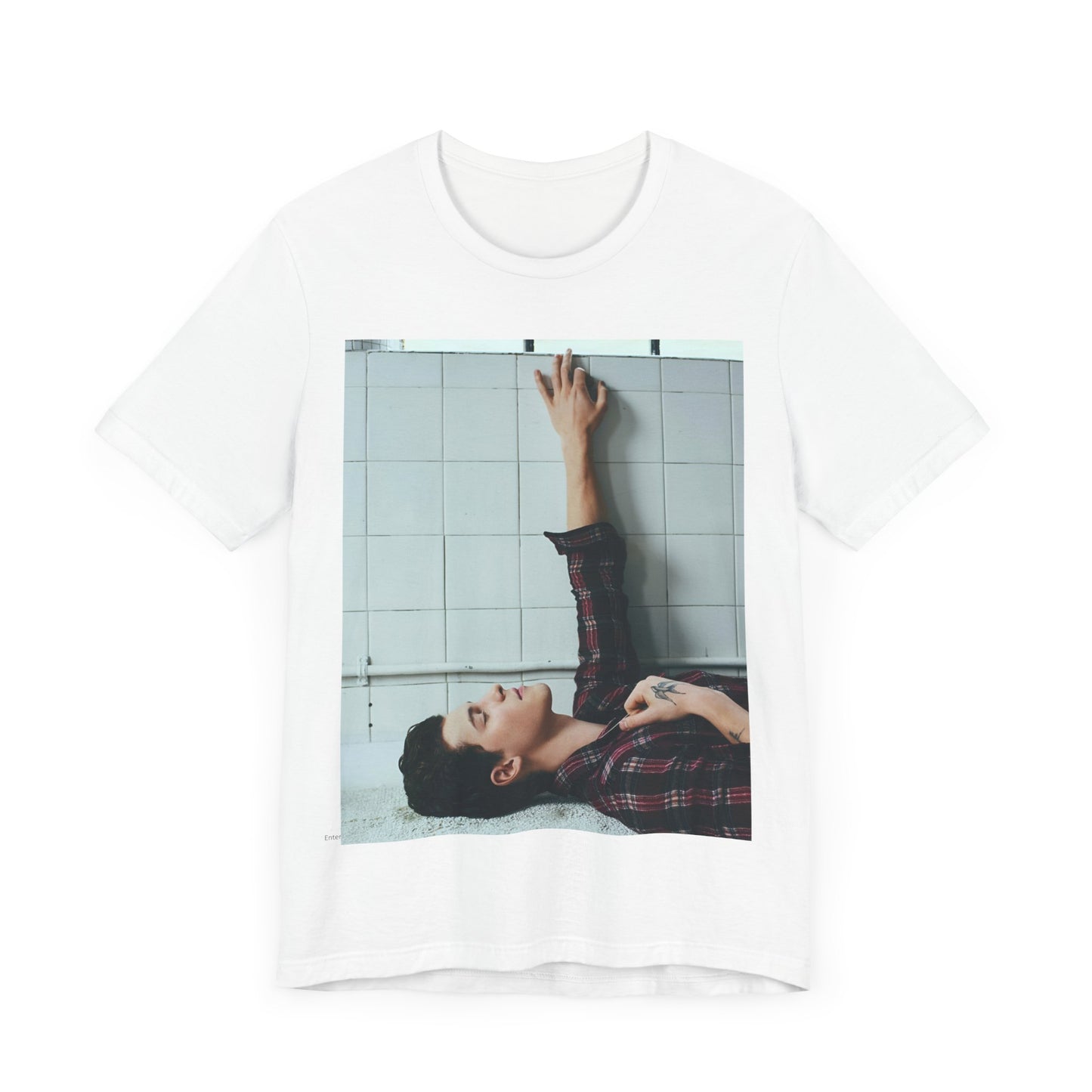 A black graphic t-shirt featuring a bold graphic of Shawn Mendes as a superstar.