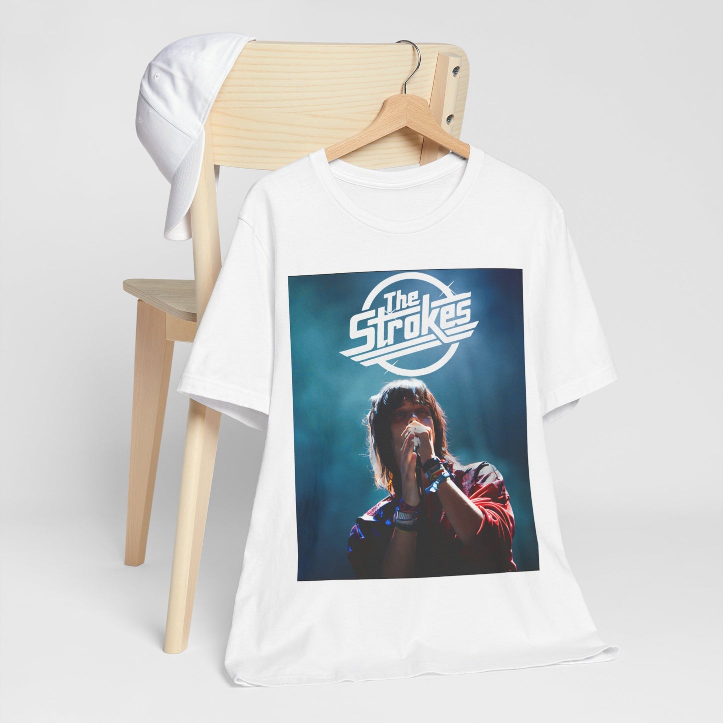 A black graphic t-shirt featuring a portrait or graphic of Julian Casablancas from The Strokes.