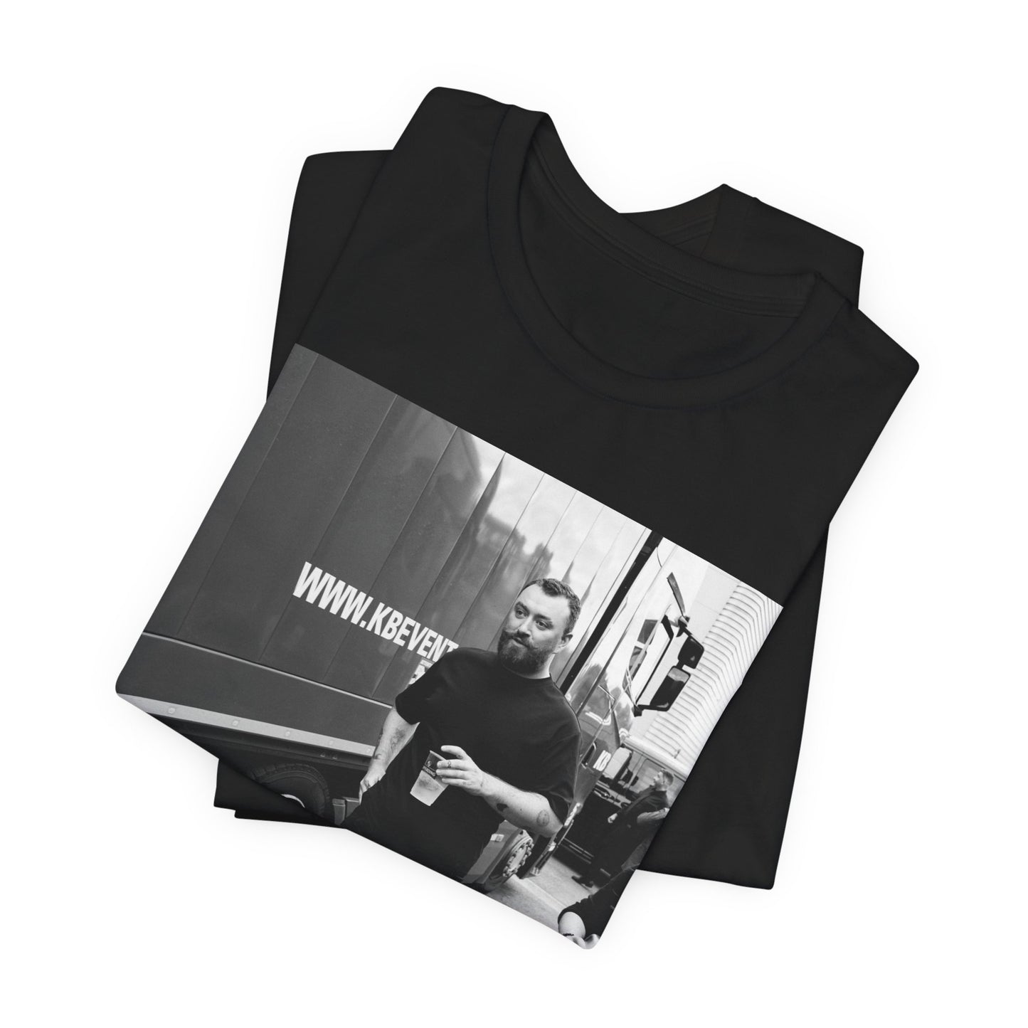 A black graphic t-shirt featuring a graphic or photo of Sam Smith in a backstage setting.