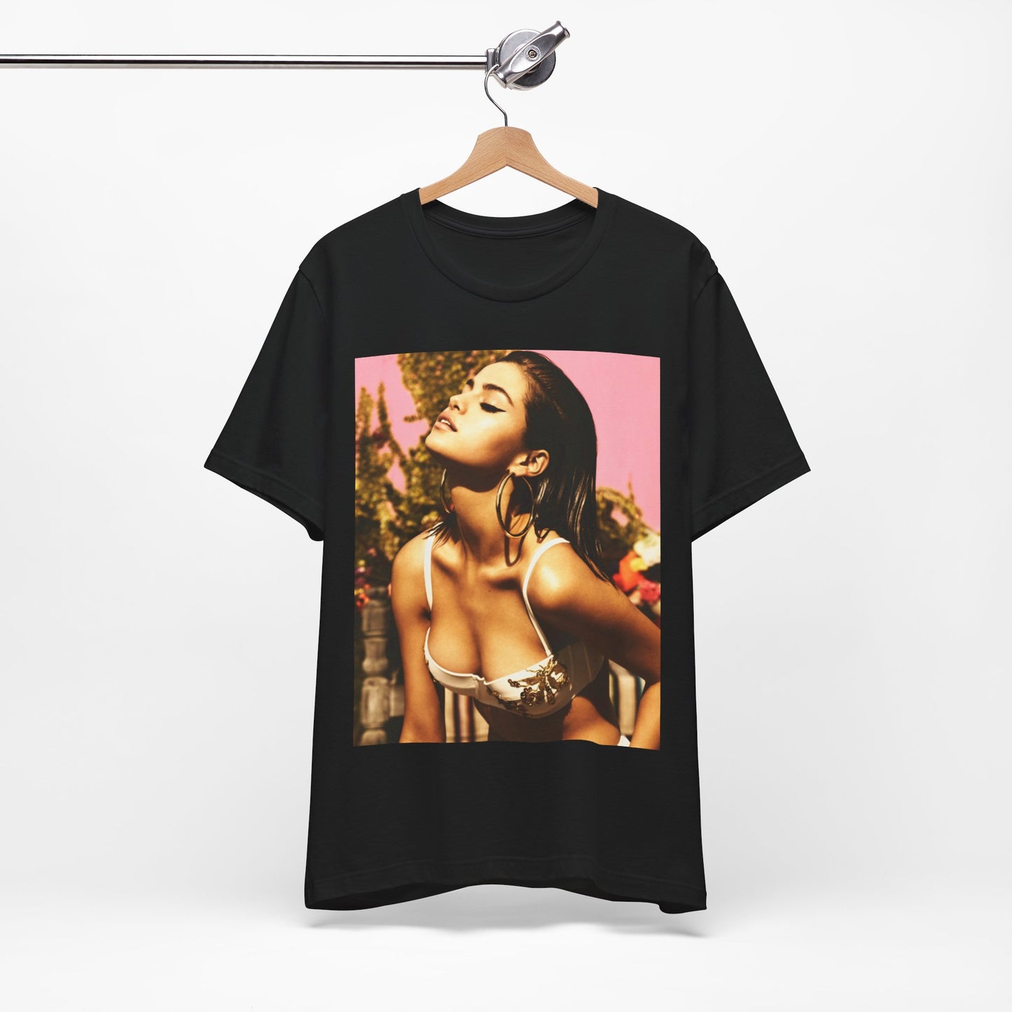 A black graphic t-shirt featuring a graphic of Selena Gomez emphasizing her timeless beauty.