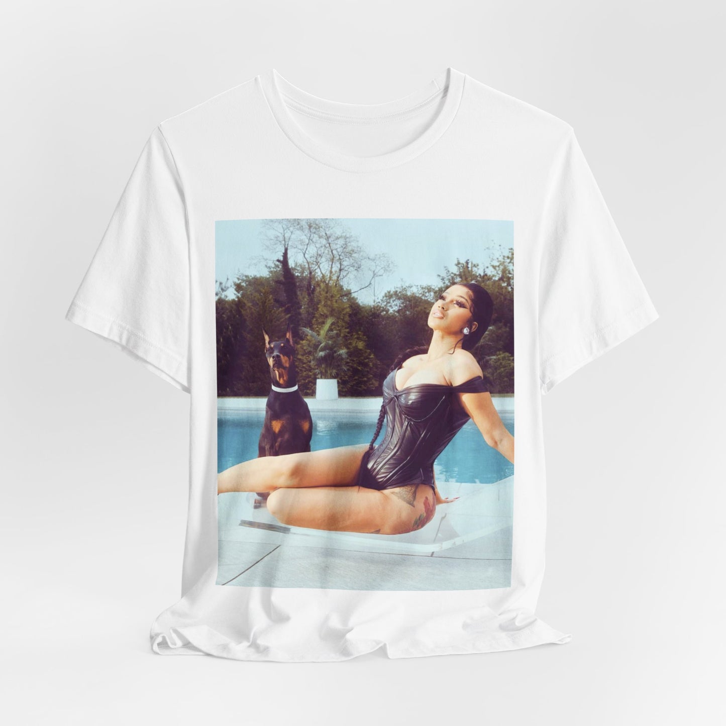 A black graphic t-shirt featuring a graphic related to Cardi B's 'I Like It' song, with bold pop culture elements.