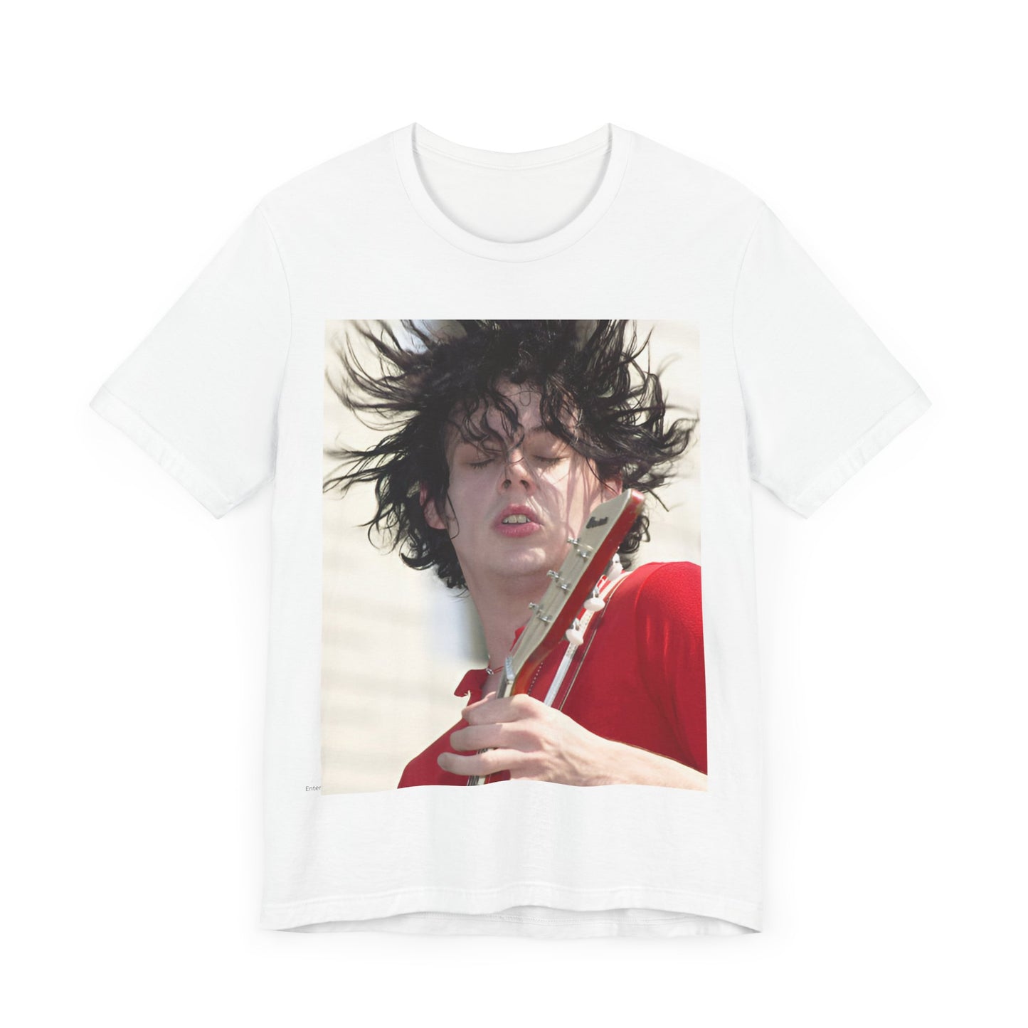 A black graphic t-shirt featuring a retro graphic of Jack White from The White Stripes playing guitar.