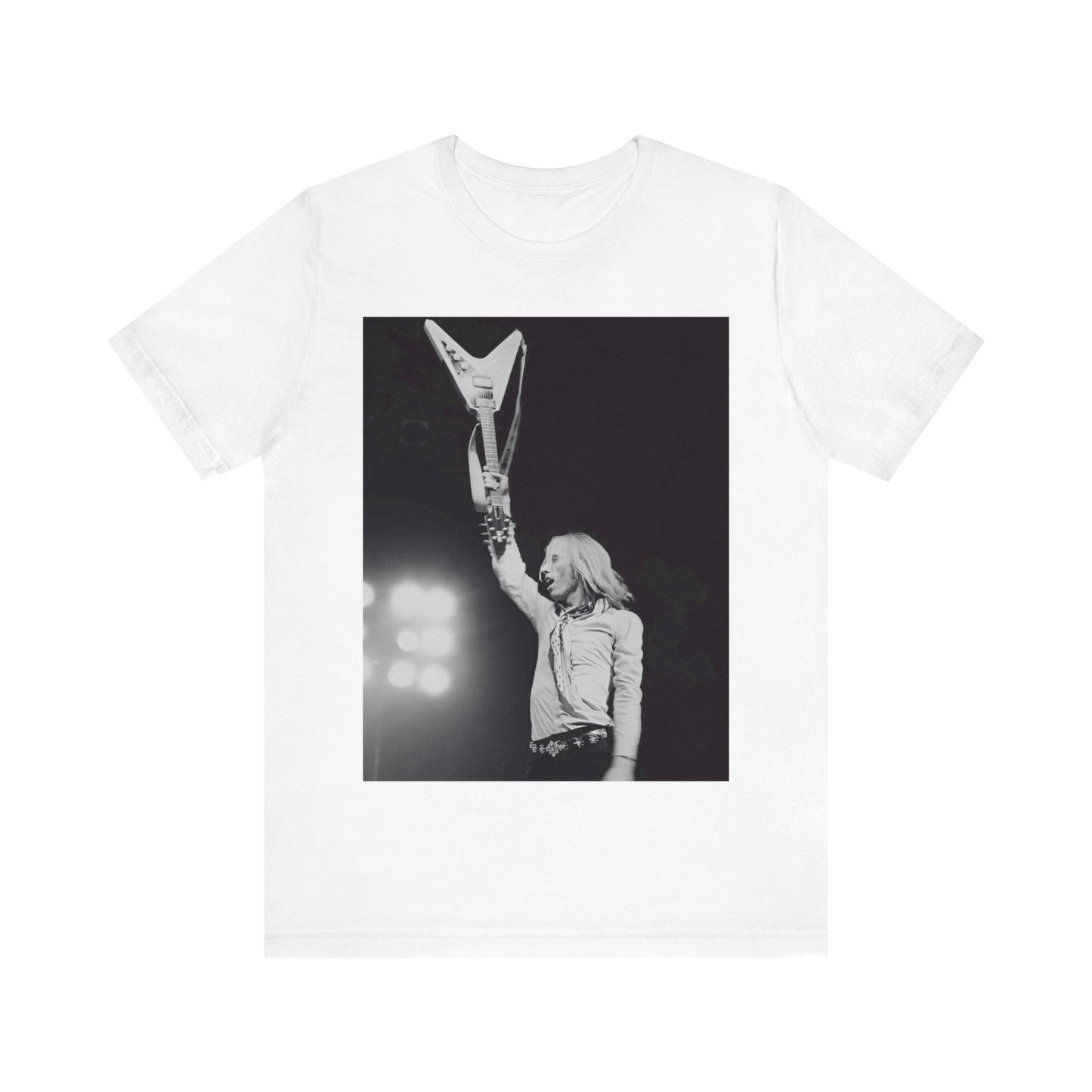 A black graphic t-shirt featuring a graphic or photo of Tom Petty playing guitar on stage.