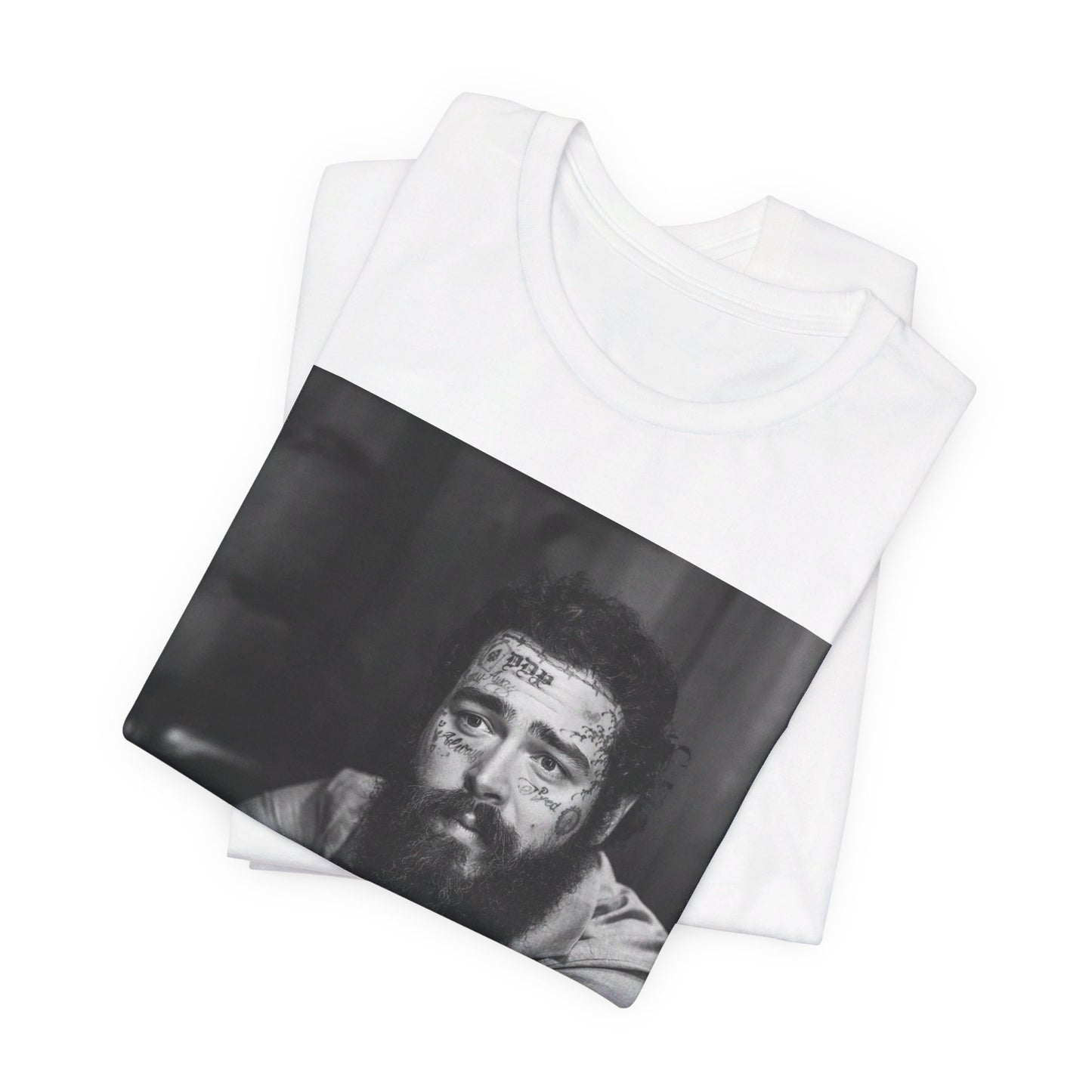 A black graphic t-shirt featuring a black and white, monochrome graphic or photo of Post Malone.