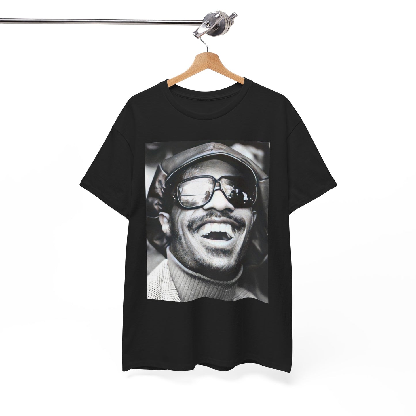 A black graphic t-shirt featuring a black and white portrait photo of Stevie Wonder.