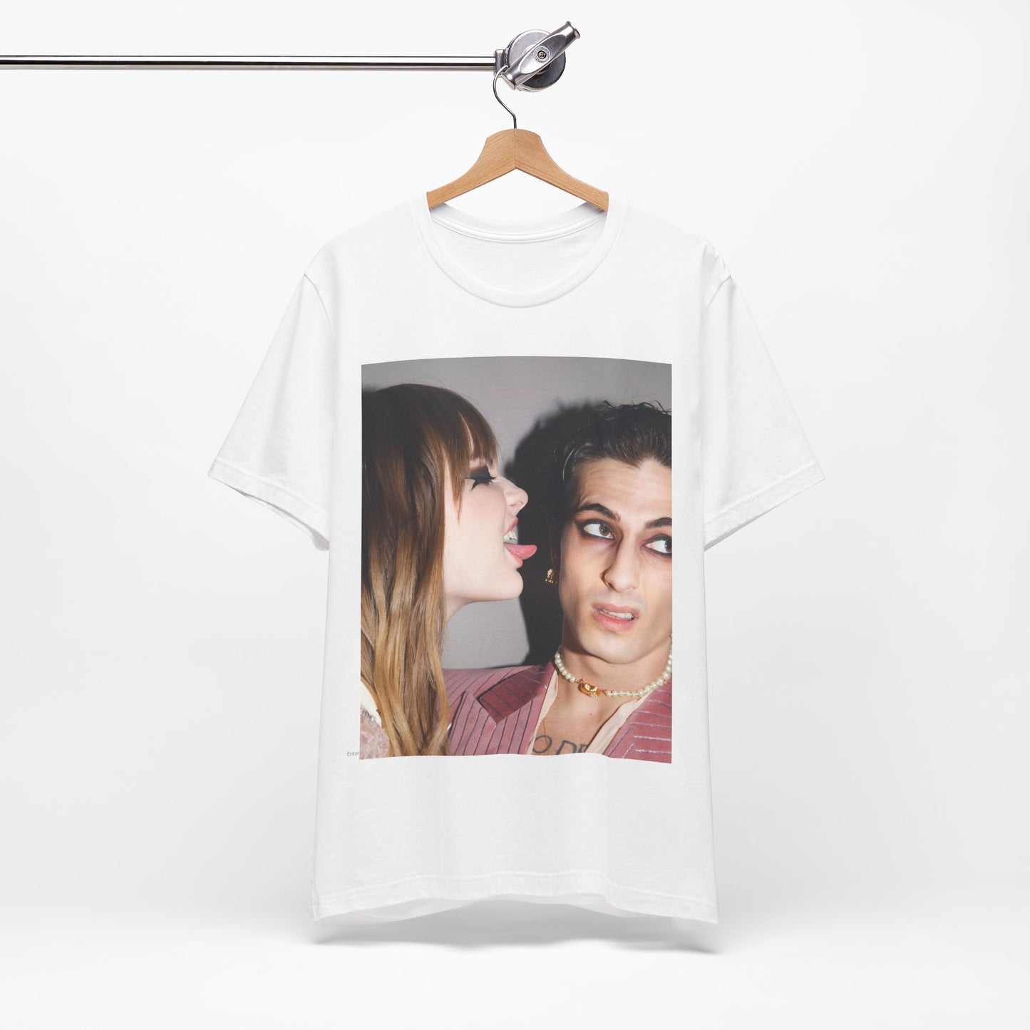 A black graphic t-shirt featuring a fearless rock and roll graphic of Maneskin.