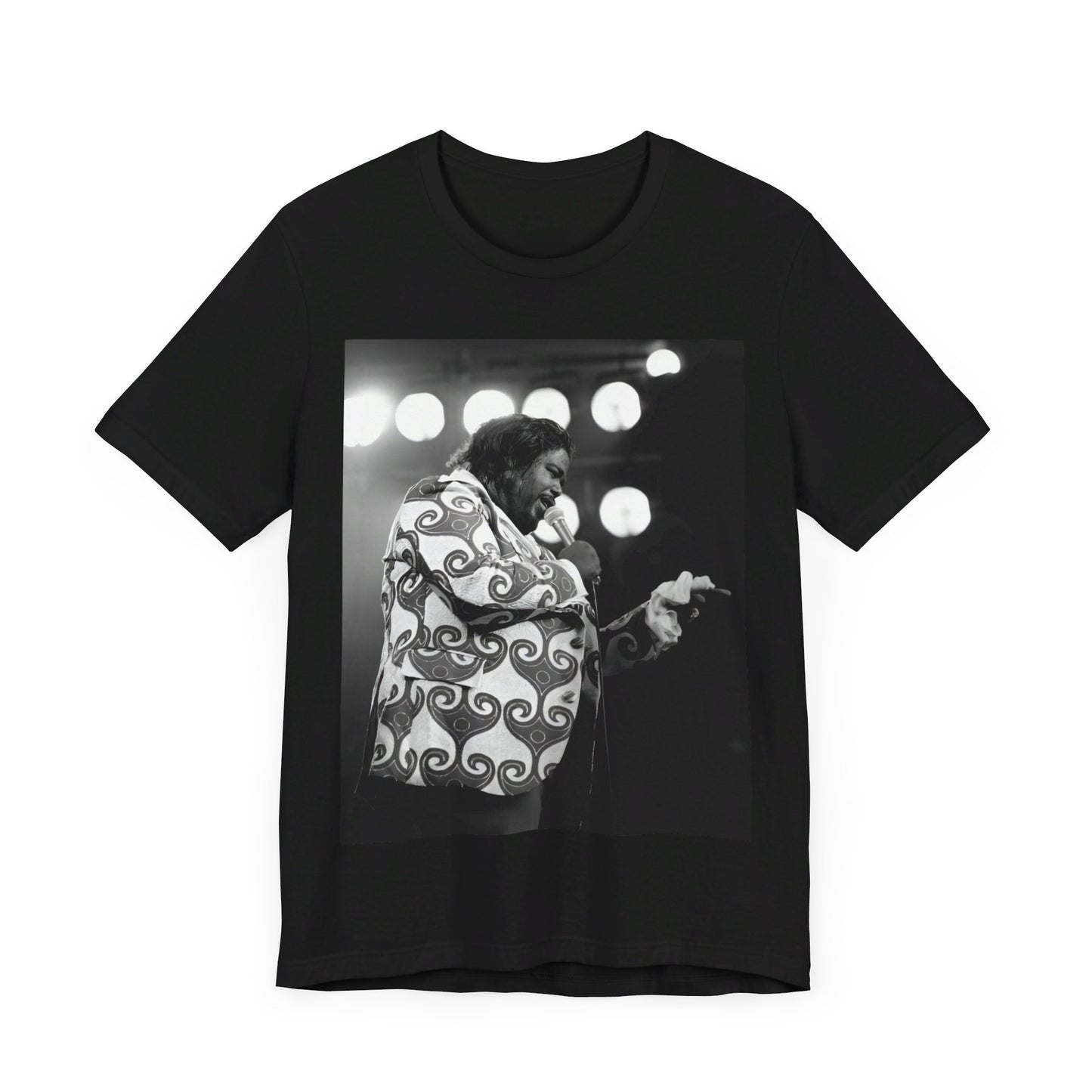 A black graphic t-shirt featuring a graphic or photo of Barry White performing live on stage in the 1970s.