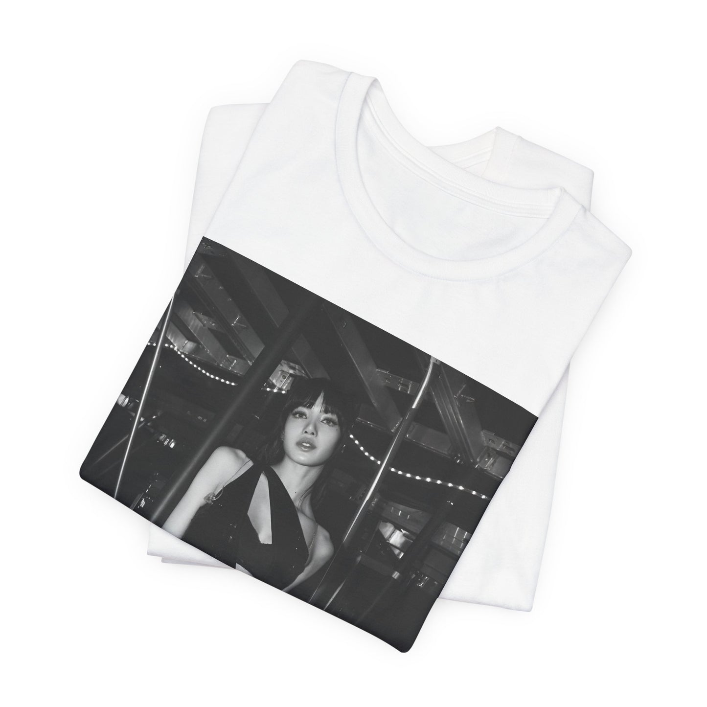 A black graphic t-shirt featuring a black and white graphic or photo of Lisa in a backstage setting.