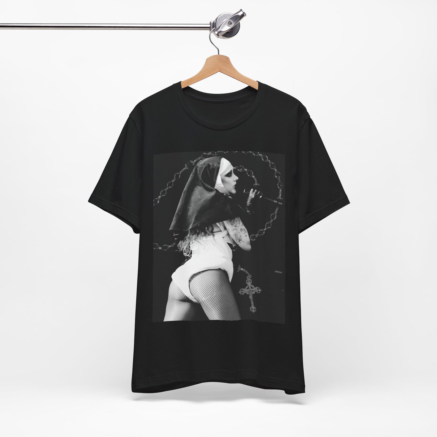 A black graphic t-shirt featuring a retro glam-style graphic of Chappell Roan dressed as a nun.