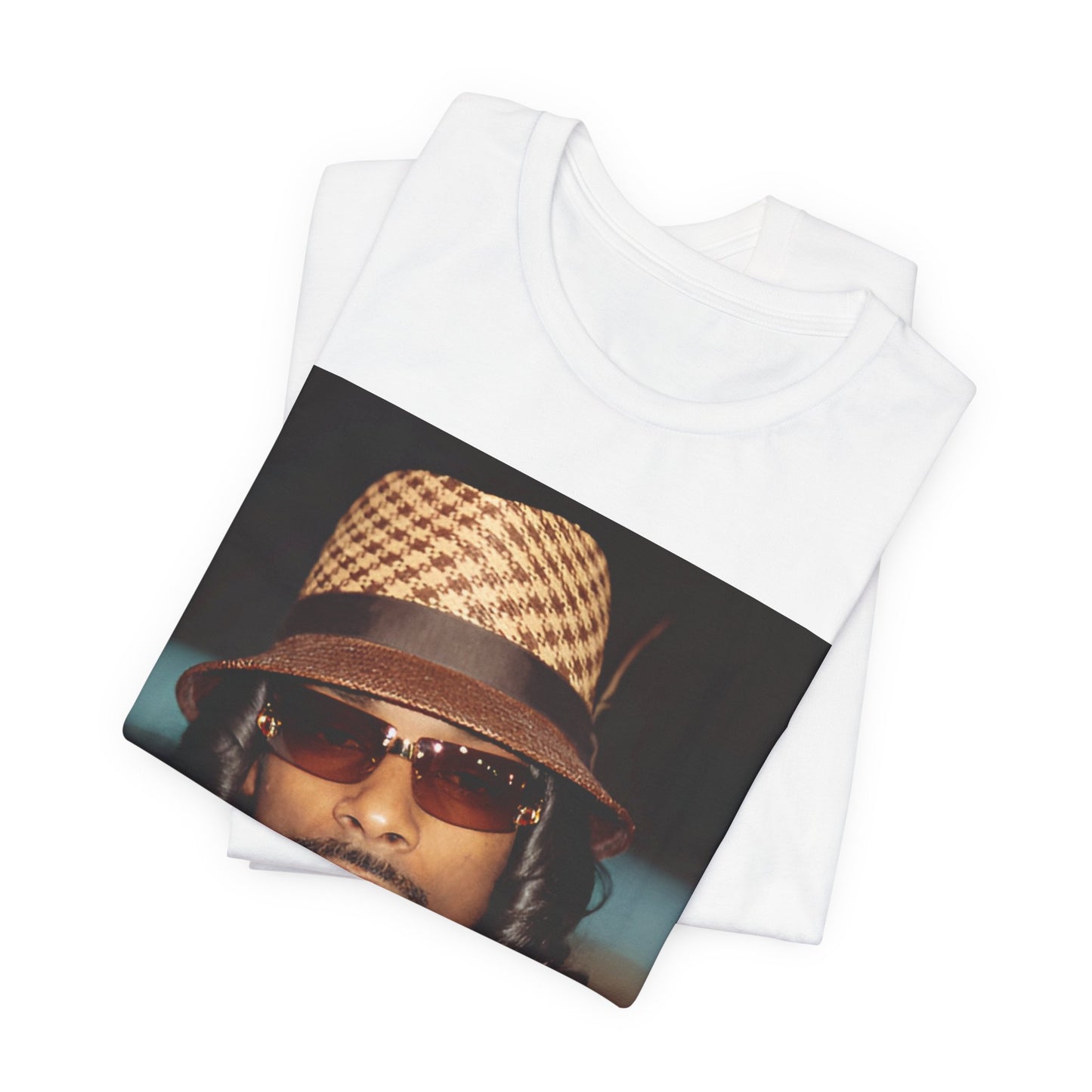 A black graphic t-shirt featuring a glamorous graphic of Snoop Dogg as a Doggfather icon.