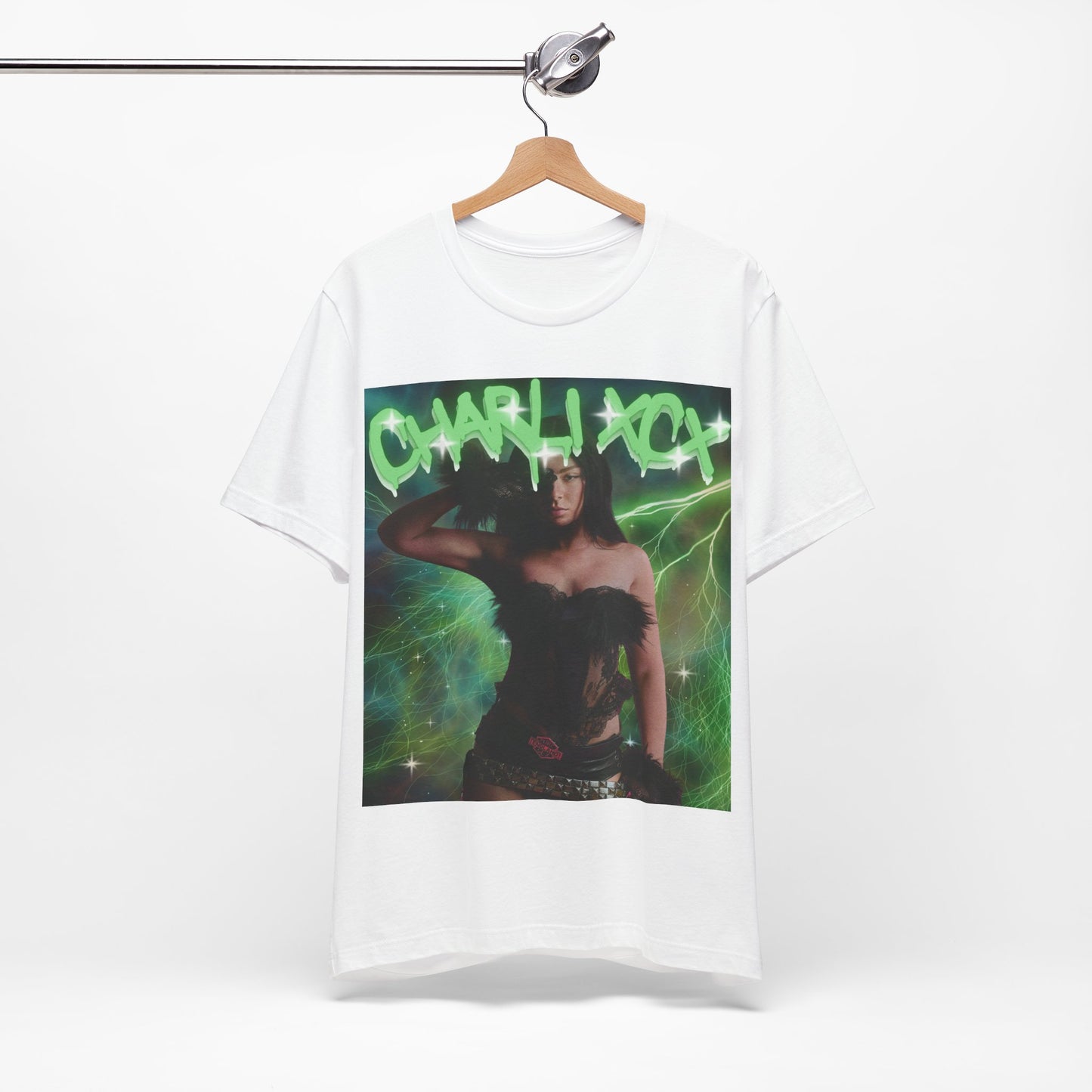 A black graphic t-shirt featuring a retro green neon graphic of Charli XCX's signature.