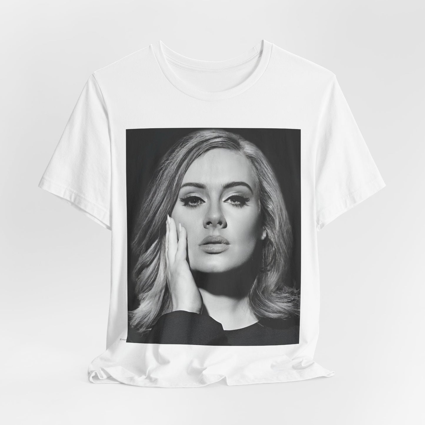 A black graphic t-shirt featuring a studio portrait of Adele from her '25' album era, showing a poised and thoughtful expression with her hair styled elegantly.