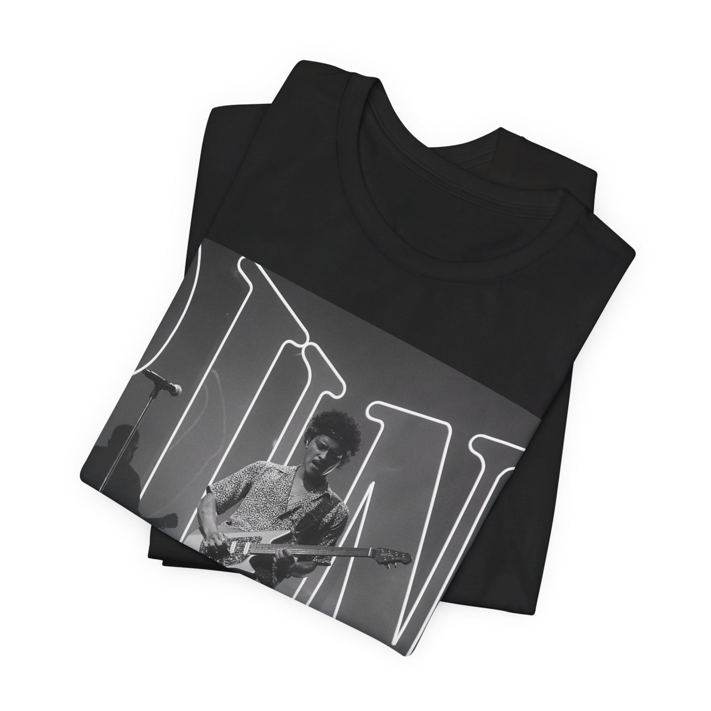 A black graphic t-shirt featuring a black and white photo of Bruno Mars performing live on stage.