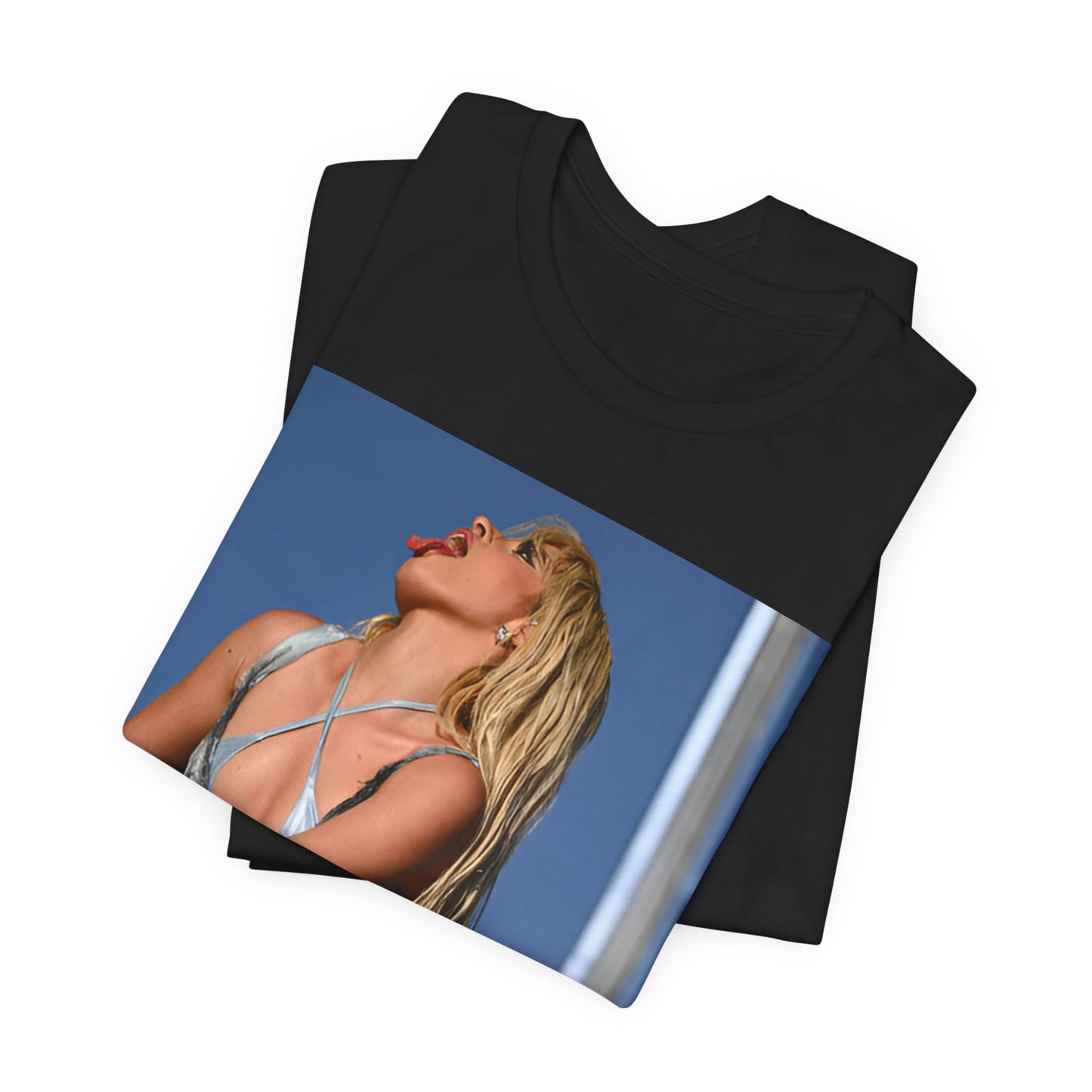 A black graphic t-shirt featuring a dynamic graphic or photo of Camila Cabello performing live on stage.
