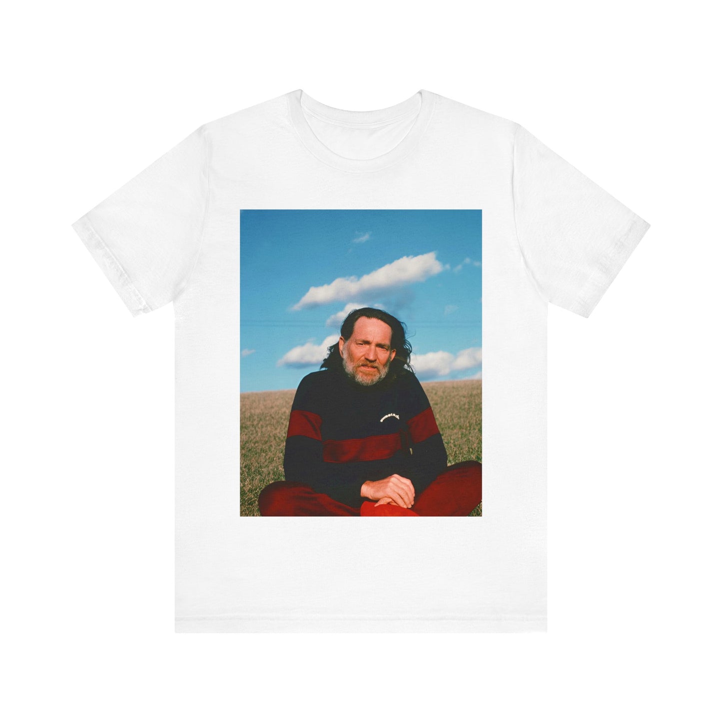 A black graphic t-shirt featuring a classic outlaw country graphic of Willie Nelson.